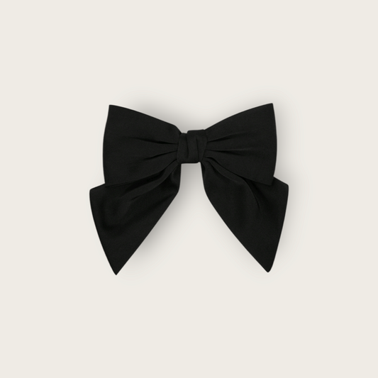 Haarklem met een zwarte korte strik voor vrouwen en meiden