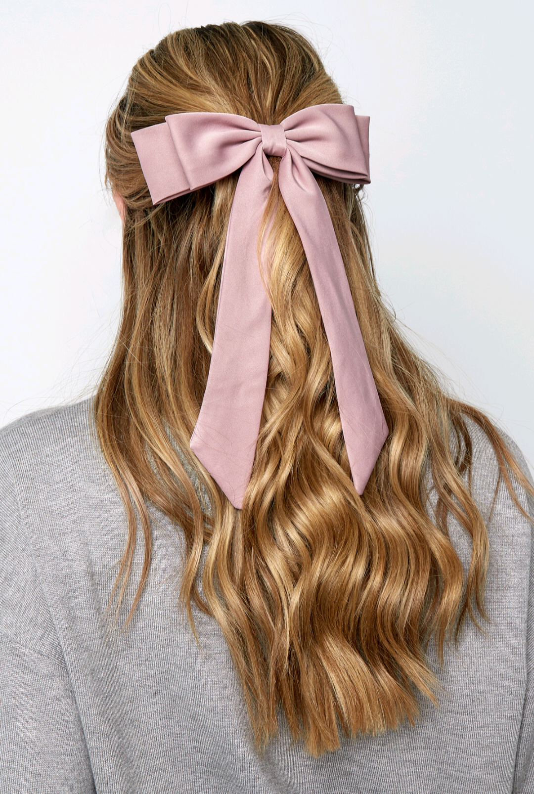 Lange roze fluwelen haarstrik met klem
