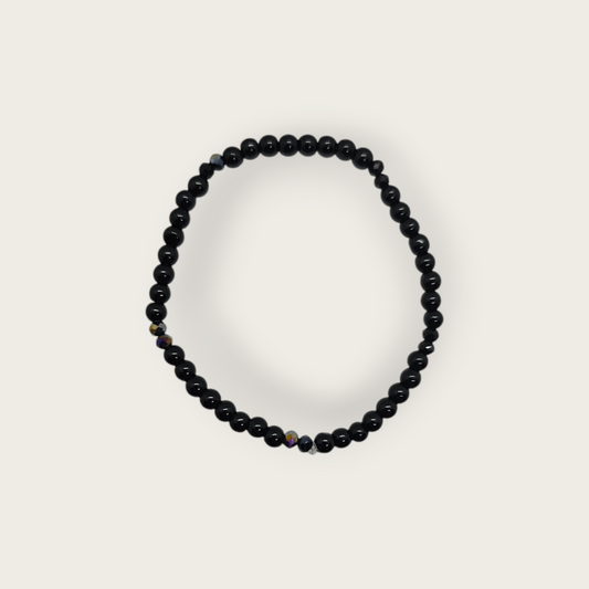 Zwarte elastieken armband met zwarte kralen